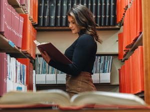 Student in Endicott Library