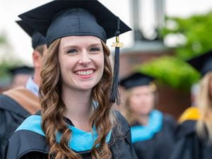 Endicott student in cap and gown