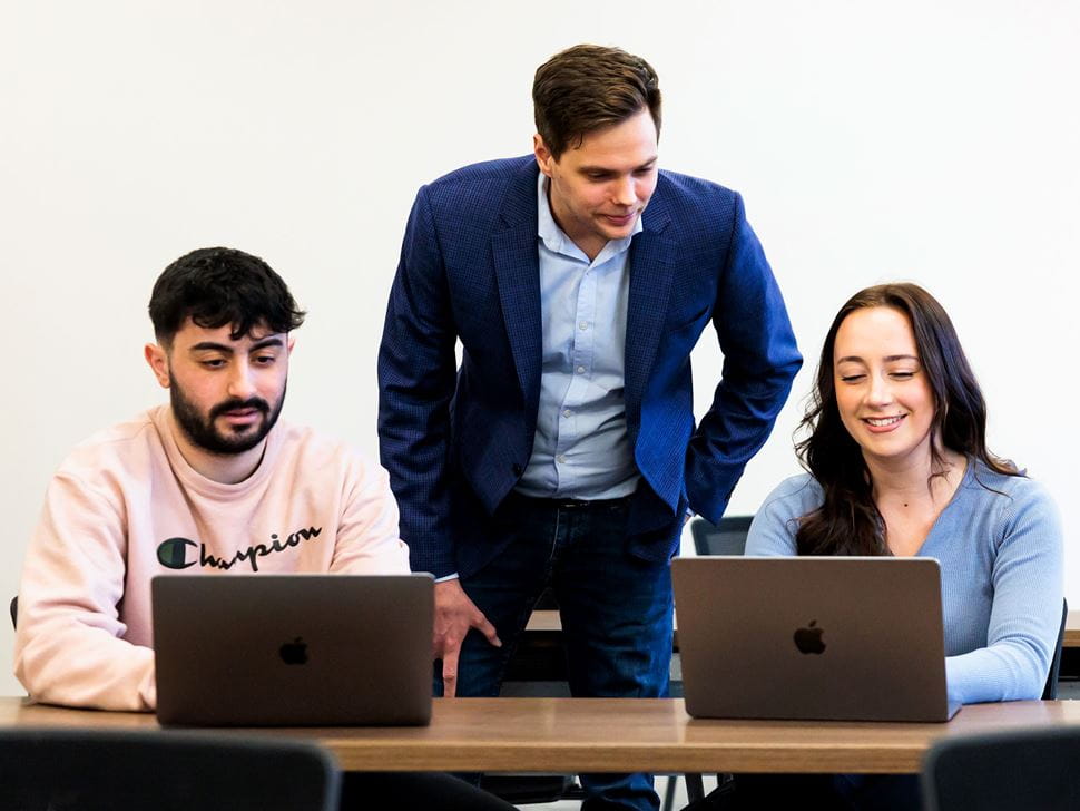 Students with a professor in class