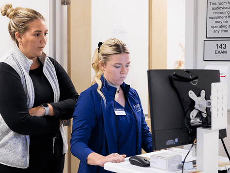 nurse on computer