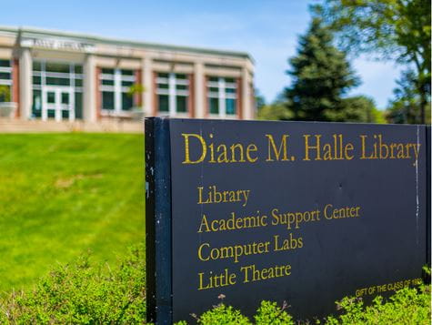 shot of halle library sign with library building behind it