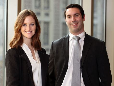 two students dressed business professional ready for internship