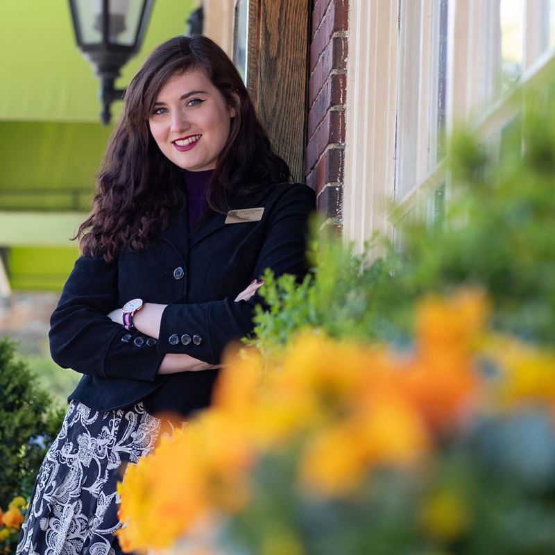 Paige Shippie standing outside the Hawthorne Hotel