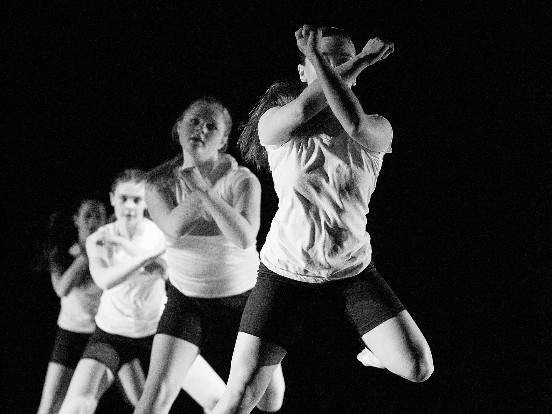 Four members of the Repertory Dance Ensemble perform