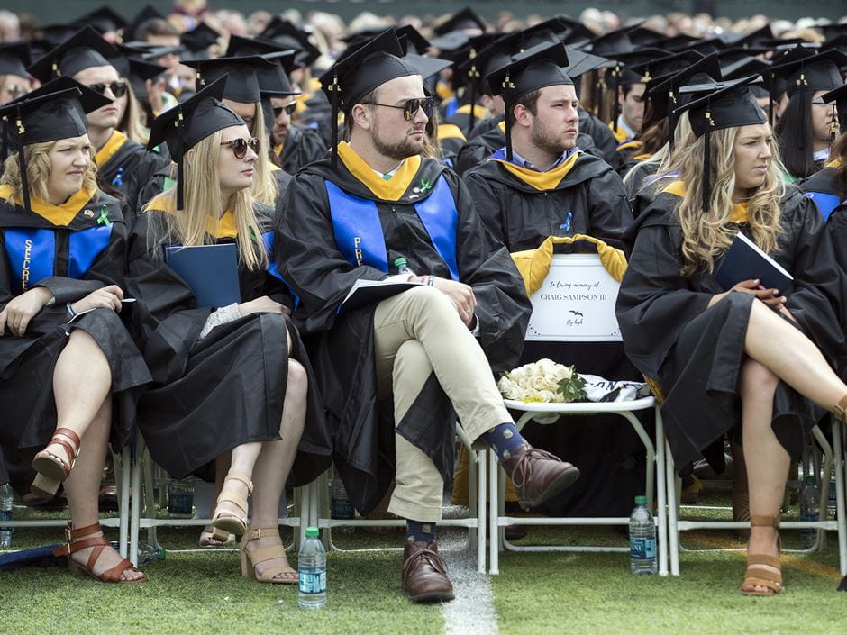 Empty chair for Craig Sampson at Commencement. 