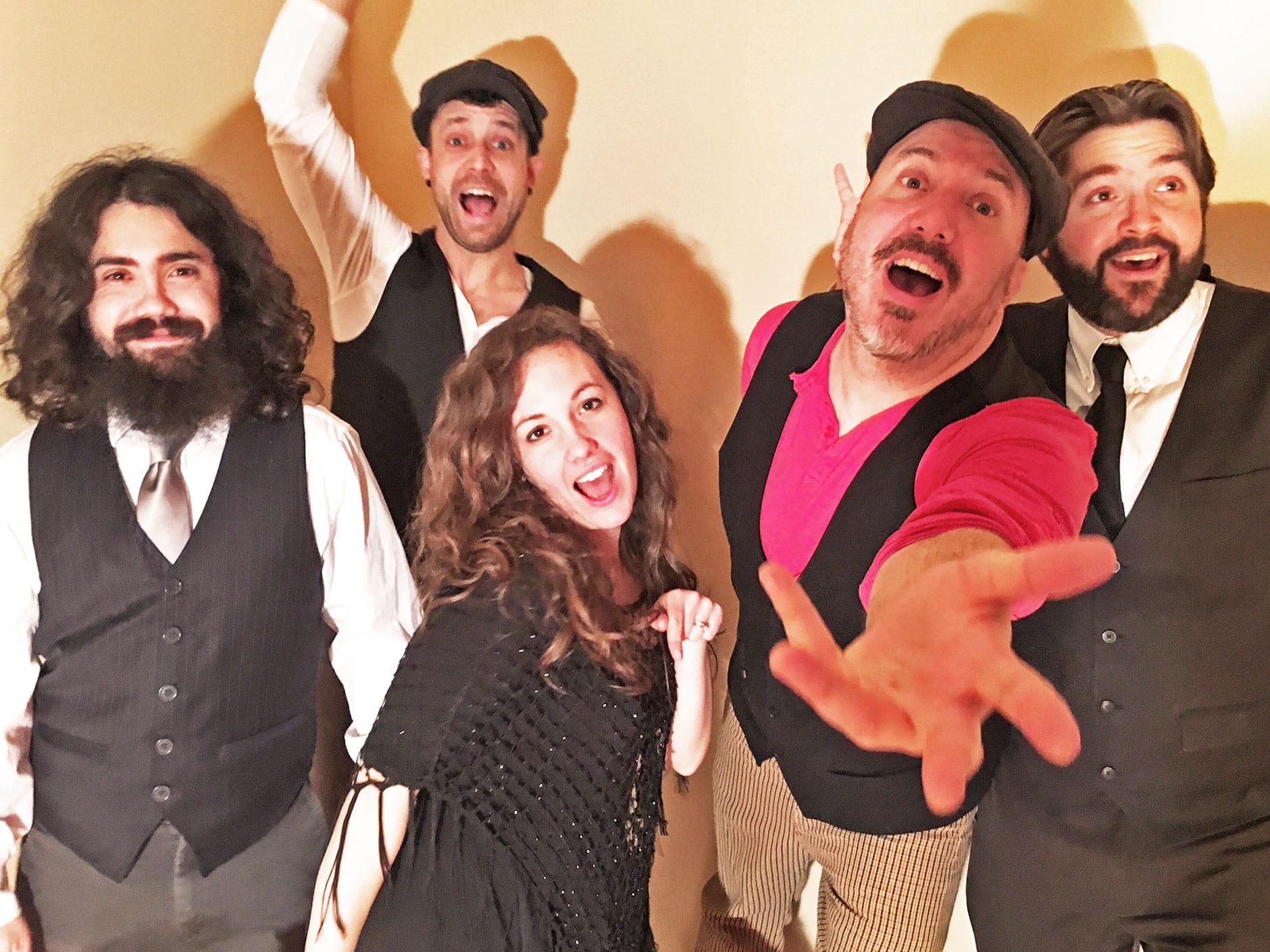 Photo of five people, members of the group performing Gravitational Fool 