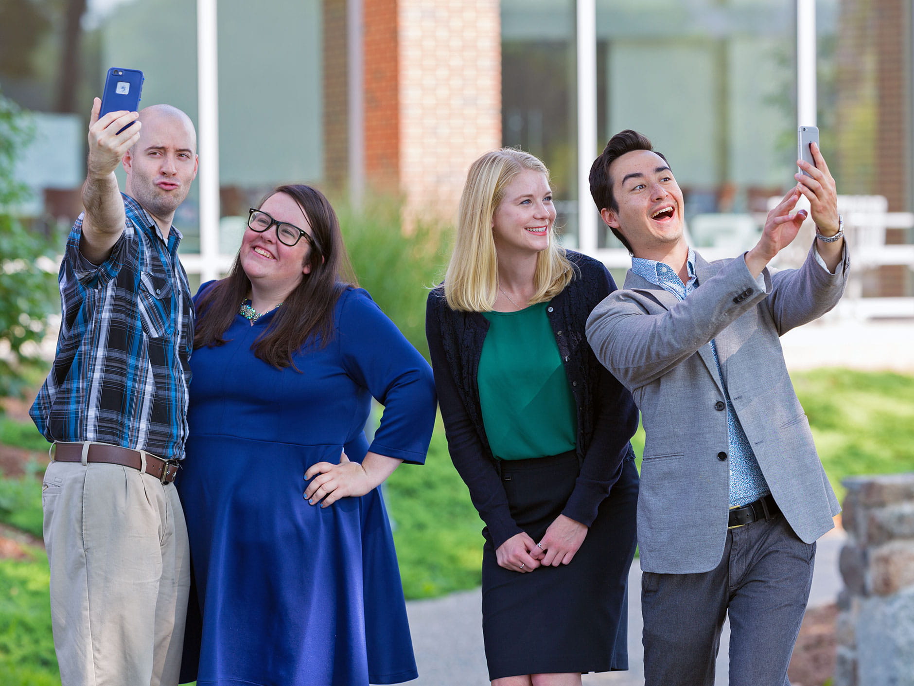 Residence Life area directors taking selfies