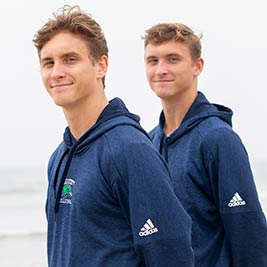 Students at Waves of Impact community service Enidcott College two boys