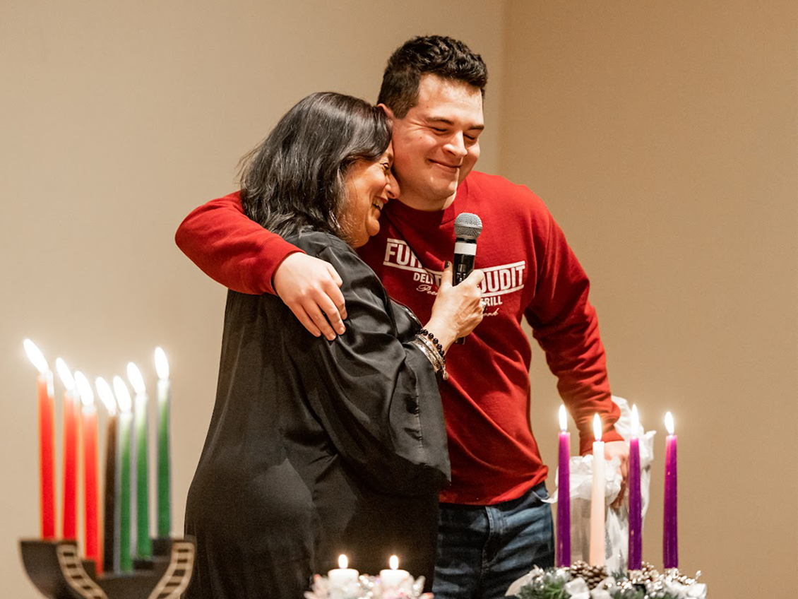 festival of light two people embracing by candles