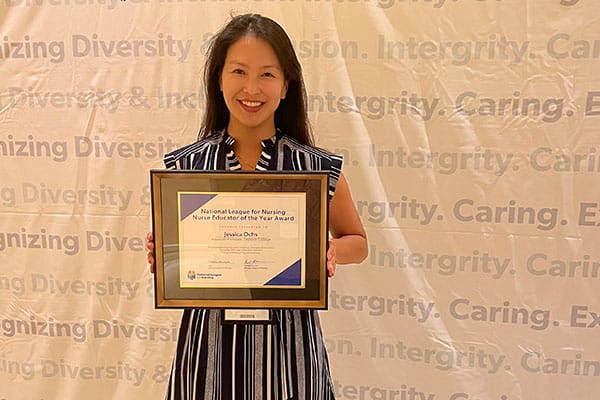 Jessica Ochs and her Nursing Educator of the Year Award