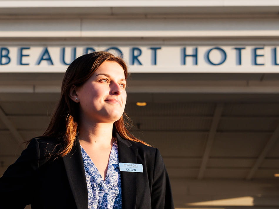 Woman in front of the Beauport Hotel