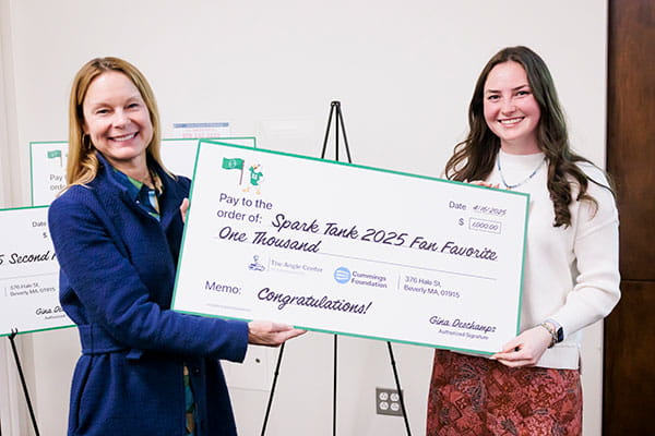 Provost Dr. Sara Quay with Abbey Agrodnia ’26 receiving the award for fan favorite