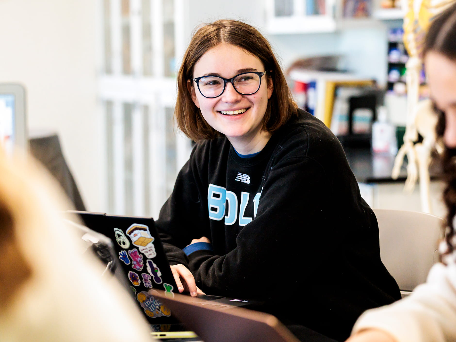 Endicott College student in class