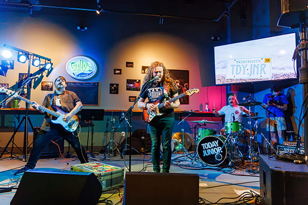 Members of the band Today Junior perform live at Gully’s at Endicott College.