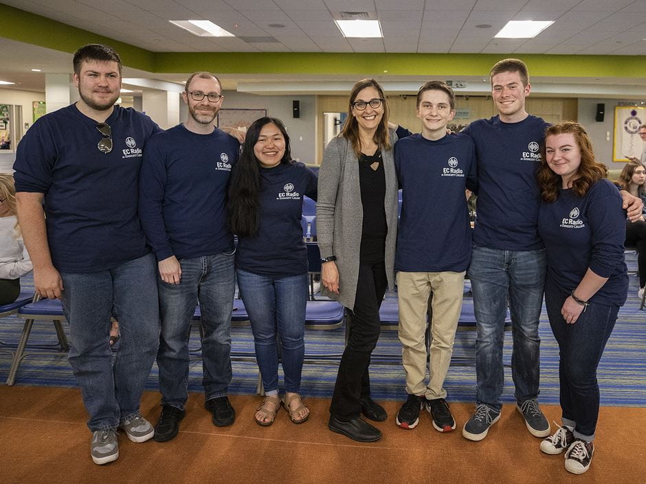 Beloved DJ Julie Kramer with Endicott students at grand opening of EC Radio; photo by David Le.