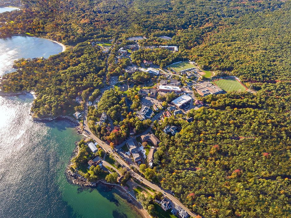 Aerial shot of Endicott College campus and ocean coastline.