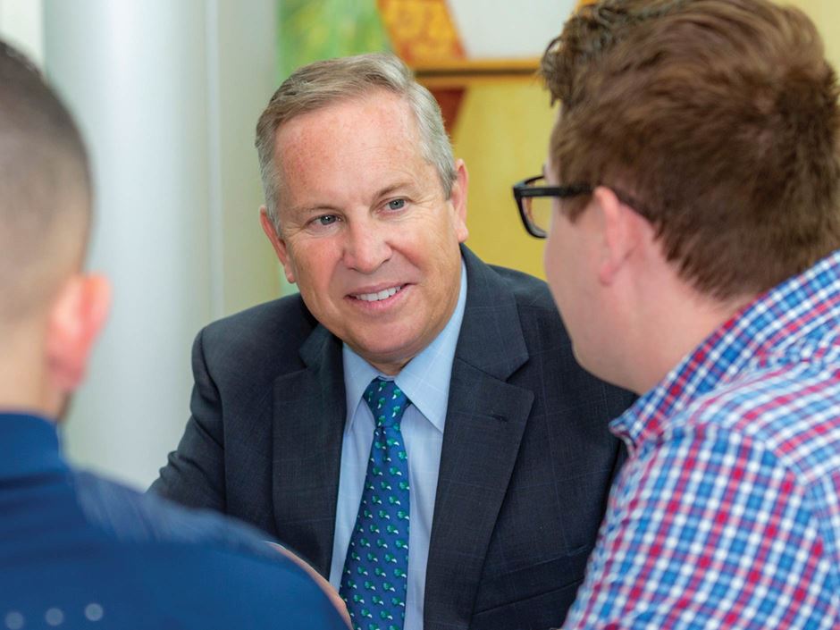 Endicott President Dr. Stephen R. DiSalvo interacts with students
