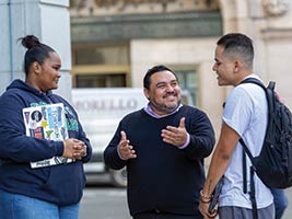 Endicott College Boston's Marcelo Juica and students