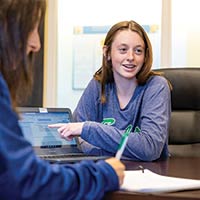 girls working at table