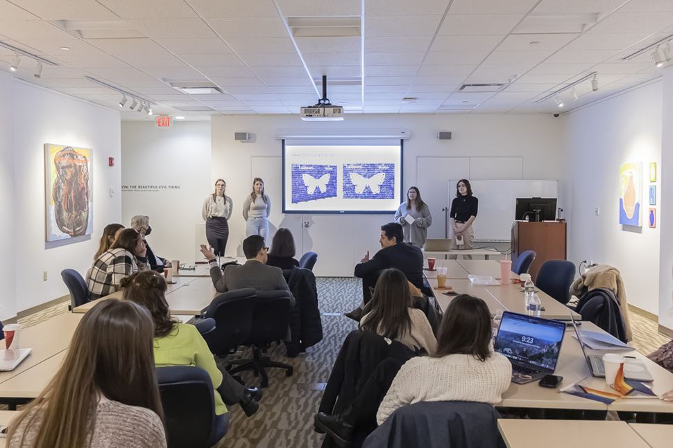 In Juan Carlos Morales’ Junior Graphic Design Studio course at Endicott College, students don’t just design, but work with local nonprofits on real-world campaigns. 