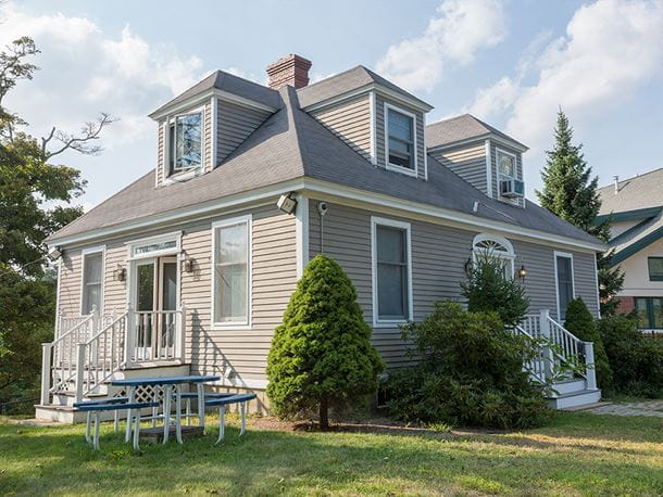 a view of a gray colored house