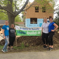 Endicott College students volunteering