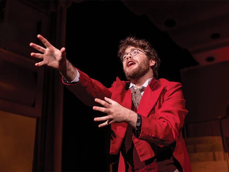 Endicott student in a theatre performance