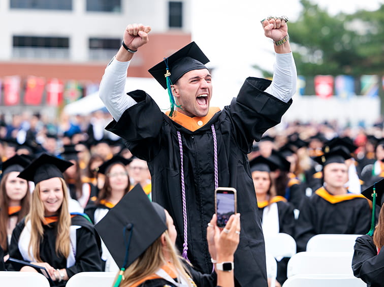 Students cheering at Commencement