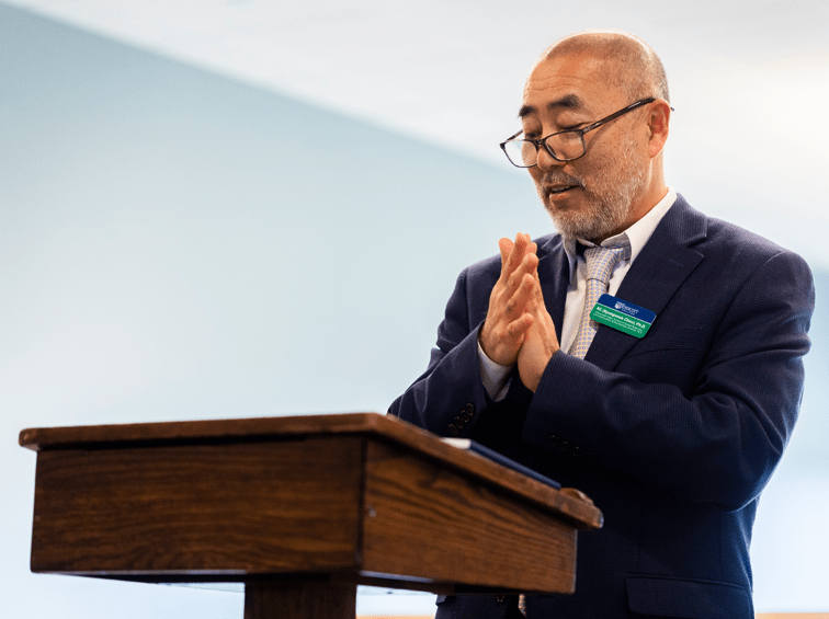 Professor at a podium